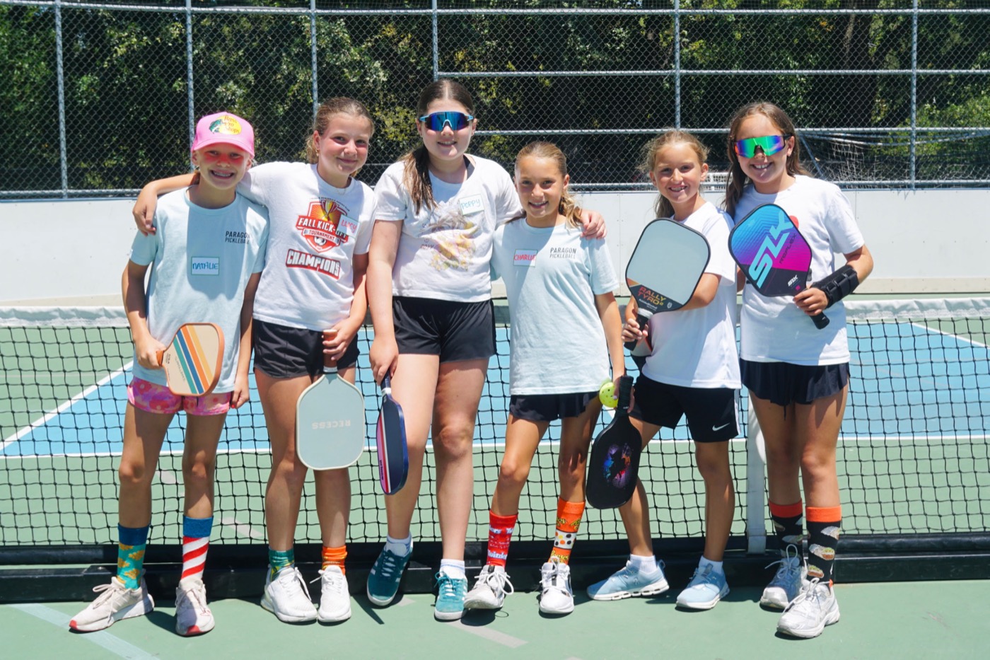 Junior campers lined up at the net during a Paragon summer camp